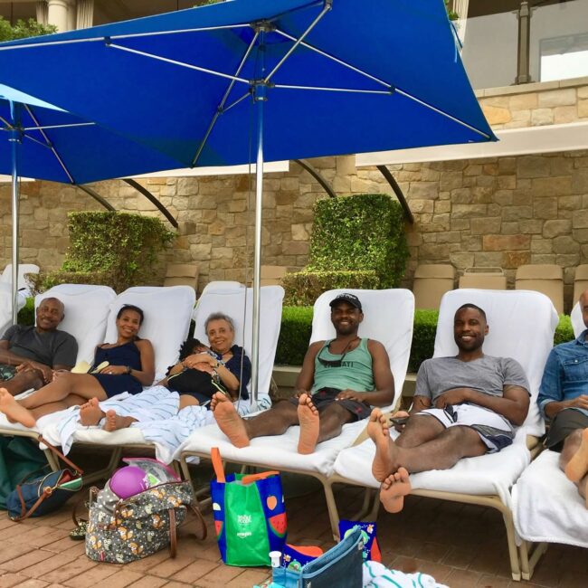 Helen's family relaxing by the pool.