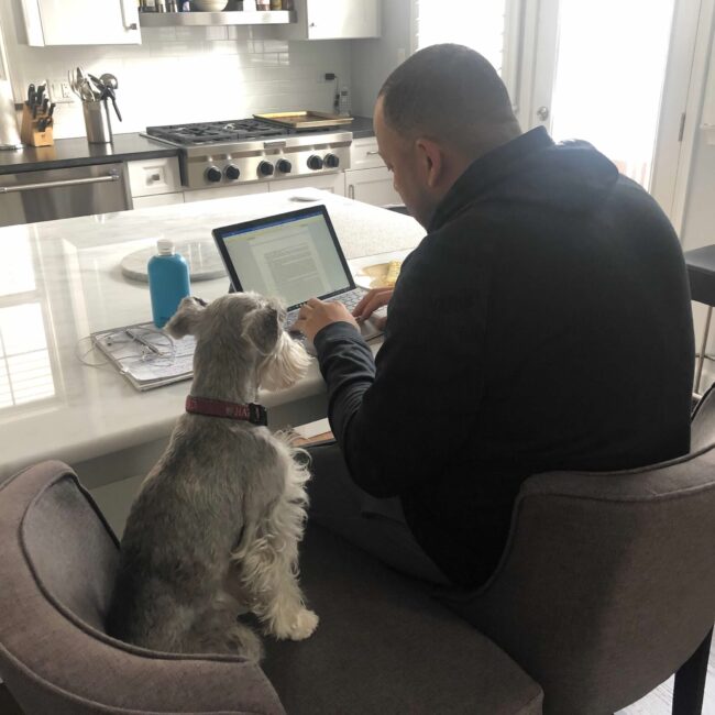 Boston helping Kurt with his work.