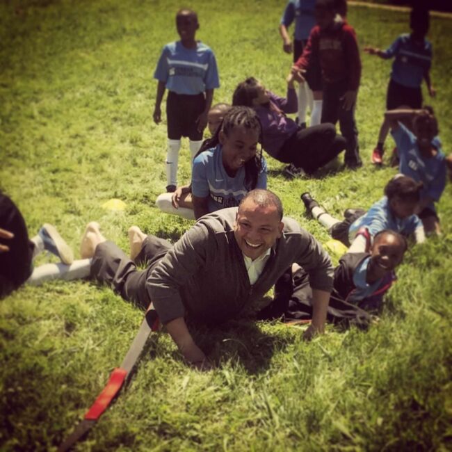 Kurt having fun in a competitive tug-of-war.