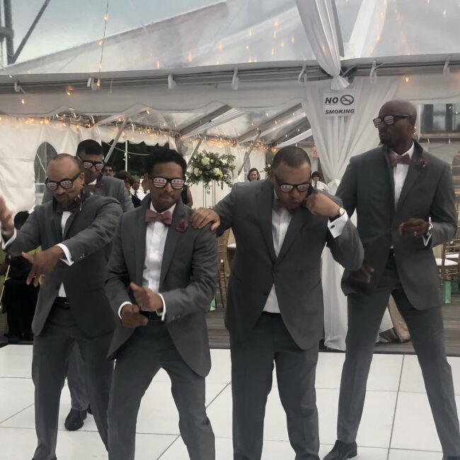 Groomsmen dance.