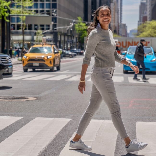 Helen walking the vibrant streets of the Big Apple.